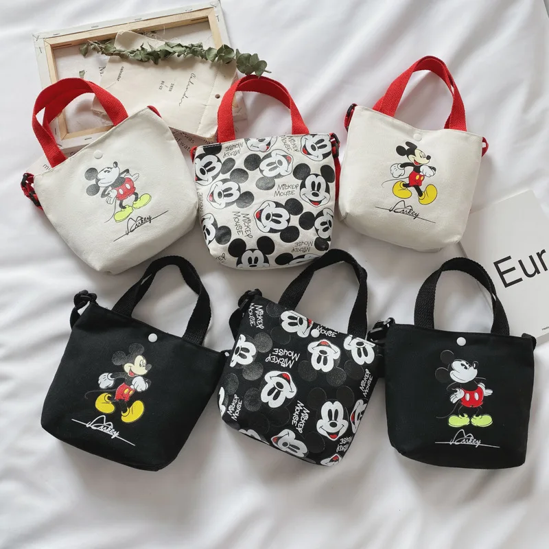 Disney cartoon cute Mickey mouse diagonal shoulder bag portable Korean canvas small bag kid girls coin bags
Disney cartoon cute Mickey mouse diagonal shoulder bag portable Korean canvas small bag kid girls coin bags