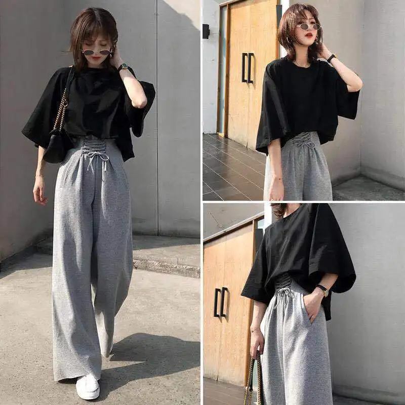 Women's Sportswear Summer Loose And Versatile High Waist Wide Leg Pants Show Thin Solid Color T-shirt Two Piece Set
Women's Sportswear Summer Loose And Versatile High Waist Wide Leg Pants Show Thin Solid Color T-shirt Two Piece Set