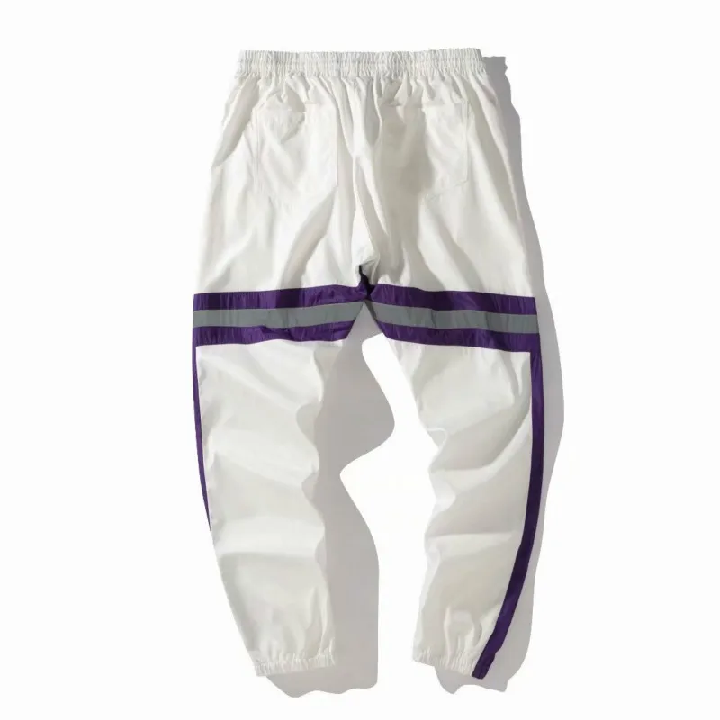Hip Hop Windbreaker Streetwear Trousers Harem Pants Male Striped Reflective Stitching Color Block Patchwork Track Pants Mens
Hip Hop Windbreaker Streetwear Trousers Harem Pants Male Striped Reflective Stitching Color Block Patchwork Track Pants Mens