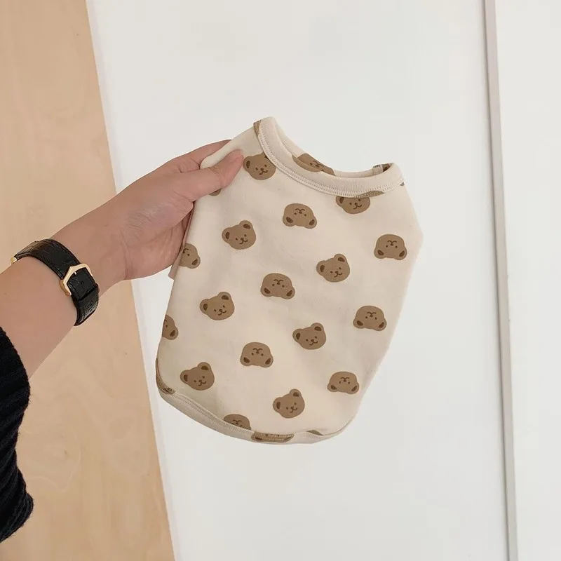Cream Bear Print Dog Clothes for Small Medium Dogs Popular Korean Style Cotton Dog Vest Soft Dog Leisure Tops Cute Puppy Costume
Cream Bear Print Dog Clothes for Small Medium Dogs Popular Korean Style Cotton Dog Vest Soft Dog Leisure Tops Cute Puppy Costume