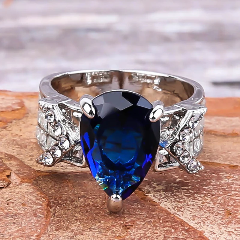 Delicate Silver Color Blue Waterdrop CZ Stone Ring Micro Paved Rhiestone Rings For Women Girl Wedding Party Jewelry Gift B4M815
Delicate Silver Color Blue Waterdrop CZ Stone Ring Micro Paved Rhiestone Rings For Women Girl Wedding Party Jewelry Gift B4M815