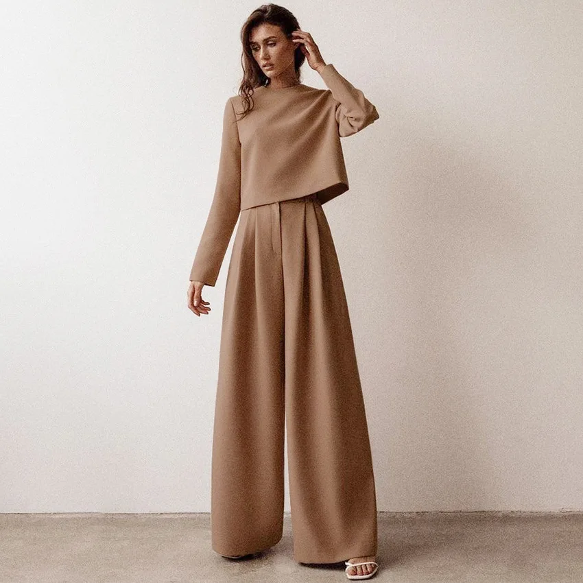 Autumn new temperament commuter round collar shirt shows slim and wide leg pants casual suit
Autumn new temperament commuter round collar shirt shows slim and wide leg pants casual suit