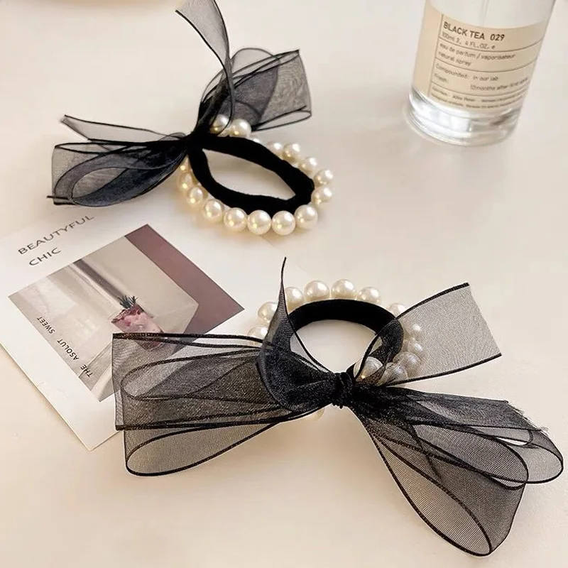 Retro Black Tie Head Rope Female Net Yarn Style Temperament Bow Knot Headdress Korean Pearls Hair Ring Ponytail Holder
Retro Black Tie Head Rope Female Net Yarn Style Temperament Bow Knot Headdress Korean Pearls Hair Ring Ponytail Holder