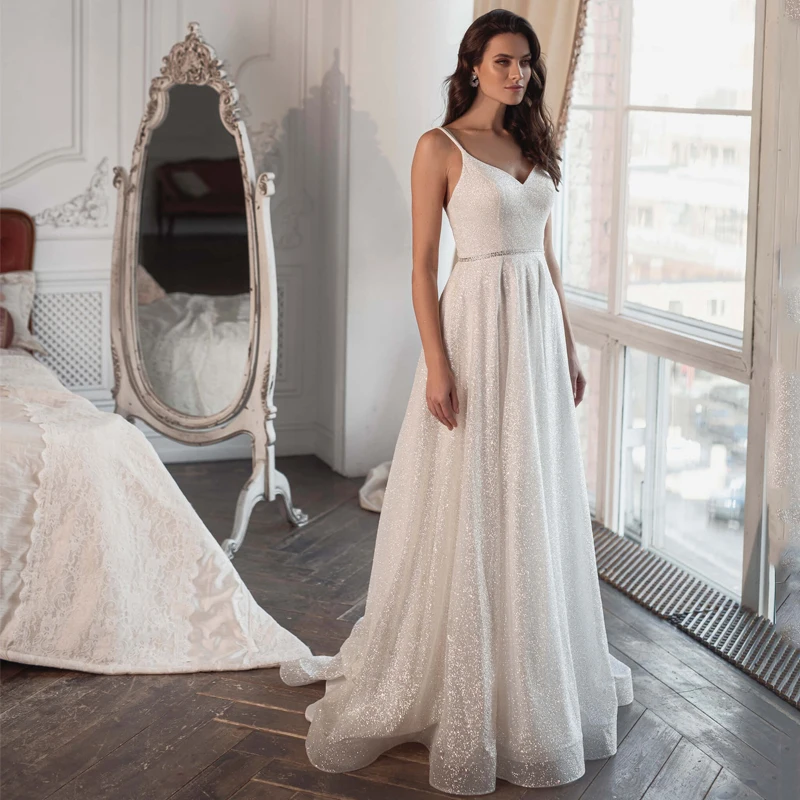 Eightree Silver Glitter Beach Wedding Dresses Spaghetti Straps Backless A-Line Bridal Gowns Zipper Back Simple Long Bride Dress
Eightree Silver Glitter Beach Wedding Dresses Spaghetti Straps Backless A-Line Bridal Gowns Zipper Back Simple Long Bride Dress