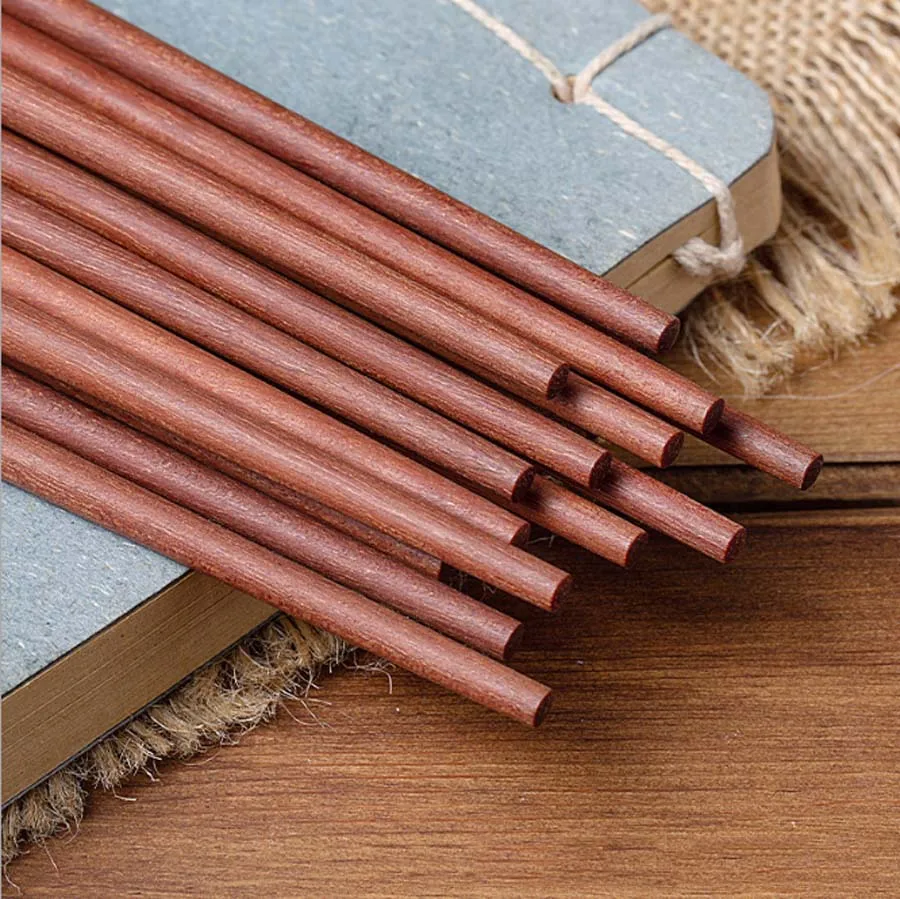 2 Pairs Natural Chicken Wing Wood Red Sandalwood Wood Health Eco-Friendly Chopsticks Tableware With Chopsticks holder 
2 Pairs Natural Chicken Wing Wood Red Sandalwood Wood Health Eco-Friendly Chopsticks Tableware With Chopsticks holder