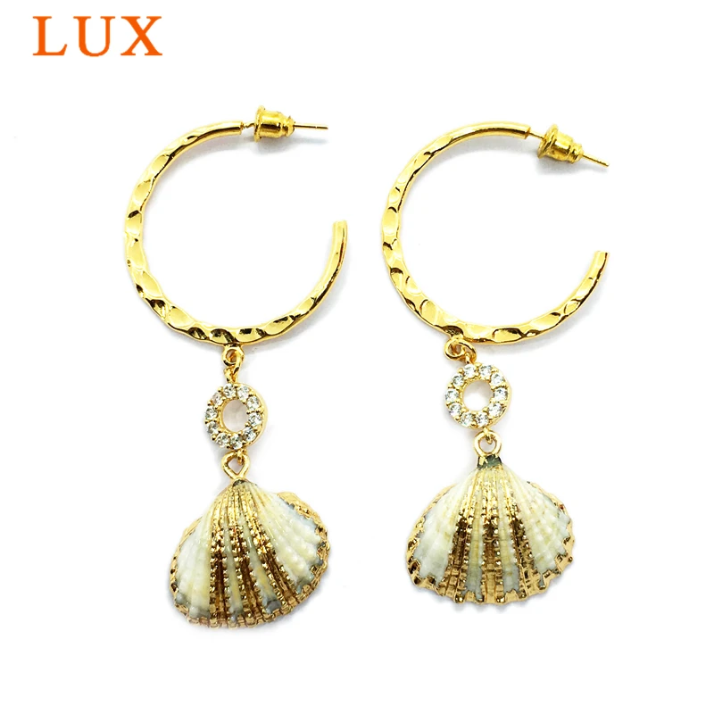 Natural Fan shape Conch shell gold color plated Earrings for Women sea Shell Drop Earrings lady summer seaside Bohemia stud
Natural Fan shape Conch shell gold color plated Earrings for Women sea Shell Drop Earrings lady summer seaside Bohemia stud