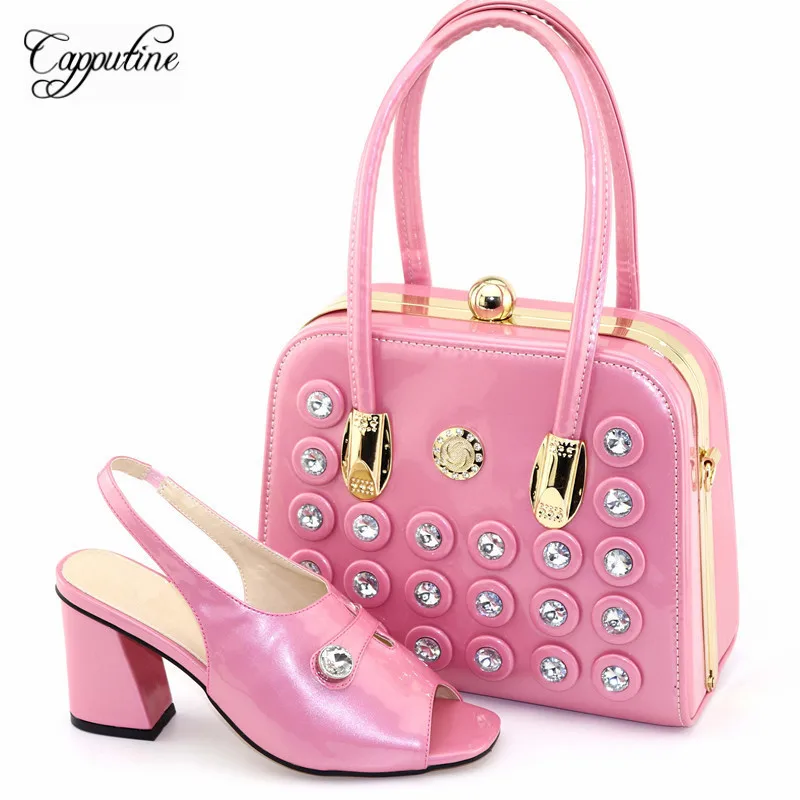 Capputine New Fashion PU Decorated With Rhinestone Shoes And Bag Set Italian Style Woman Pumps Shoes And Bag Set For Party
Capputine New Fashion PU Decorated With Rhinestone Shoes And Bag Set Italian Style Woman Pumps Shoes And Bag Set For Party