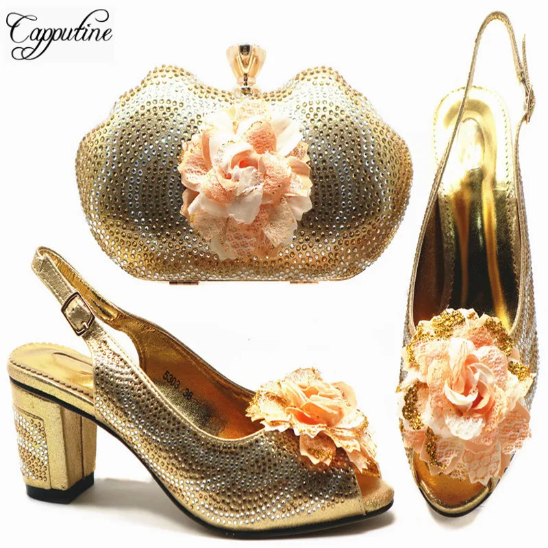 Capputine Nice Design Italian Gold Shoes With Matching Bags Latest Rhinestone African MiddleHeels Shoes And Bags Set For Party
Capputine Nice Design Italian Gold Shoes With Matching Bags Latest Rhinestone African MiddleHeels Shoes And Bags Set For Party