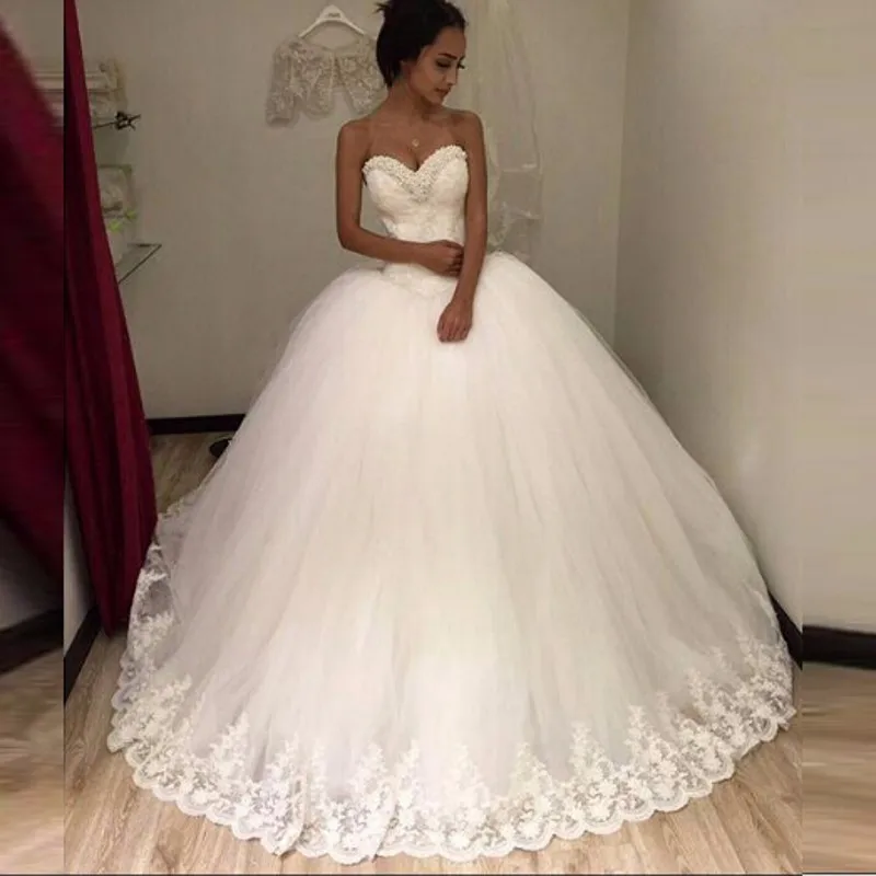 Свадебные платья 2019 Vestidos de yiiya, милое свадебное платье со шлейфом и кружевной аппликацией, расшитое бисером
Свадебные платья 2019 Vestidos de yiiya, милое свадебное платье со шлейфом и кружевной аппликацией, расшитое бисером