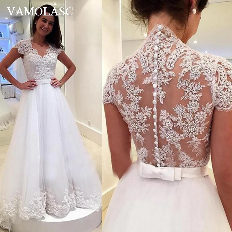 VAMOLASC Bow Sash V Neck Lace Appliques A Line Wedding Dresses Illusion Buttons Backless Sweep Train Bridal Gowns
VAMOLASC Bow Sash V Neck Lace Appliques A Line Wedding Dresses Illusion Buttons Backless Sweep Train Bridal Gowns