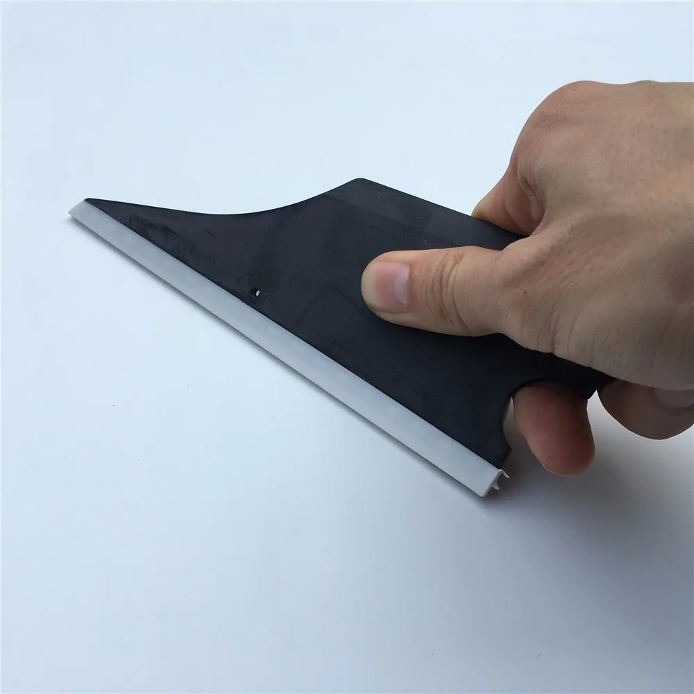 100 pcs/lot Fish Shape Rubber Ice Scraper Window Foil Tint Snow Water Remover Tools
100 pcs/lot Fish Shape Rubber Ice Scraper Window Foil Tint Snow Water Remover Tools
