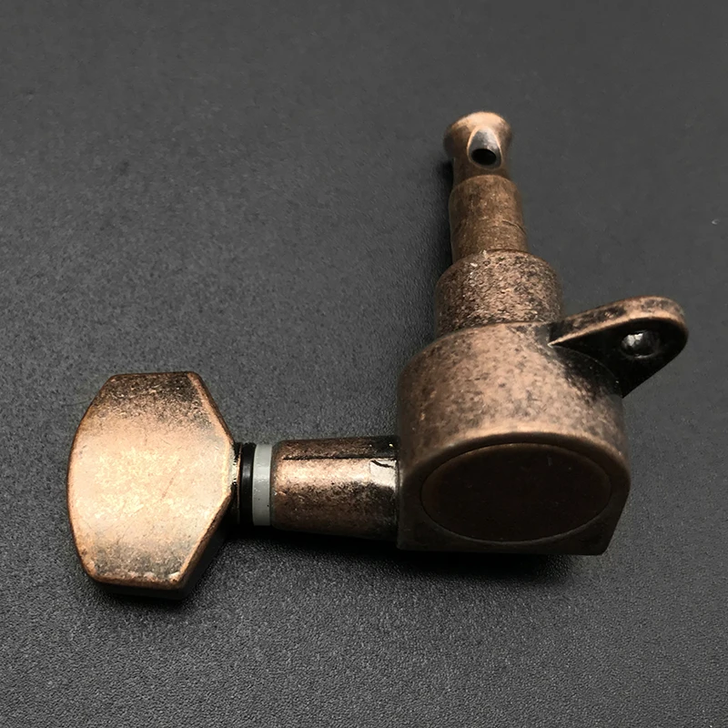 6R Guitar Machine Head Red Bronze String Tuning Pegs Key Tuners Machine Head for Acoustic Electric Guitarra Drop Shipping
6R Guitar Machine Head Red Bronze String Tuning Pegs Key Tuners Machine Head for Acoustic Electric Guitarra Drop Shipping