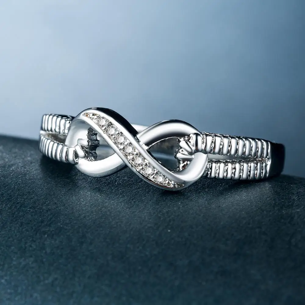 Huitan Infinity Knot Ring with Cubic Zircon Micro Pave Silver Plated Eternal Love Engagement Wedding Rings for Women&Girlfriend
Huitan Infinity Knot Ring with Cubic Zircon Micro Pave Silver Plated Eternal Love Engagement Wedding Rings for Women&Girlfriend