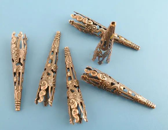 Lovely 100PCs Copper Tone Filigree Nail Spacers Beads Caps 41x8mm Findings (B03062)
Lovely 100PCs Copper Tone Filigree Nail Spacers Beads Caps 41x8mm Findings (B03062)
