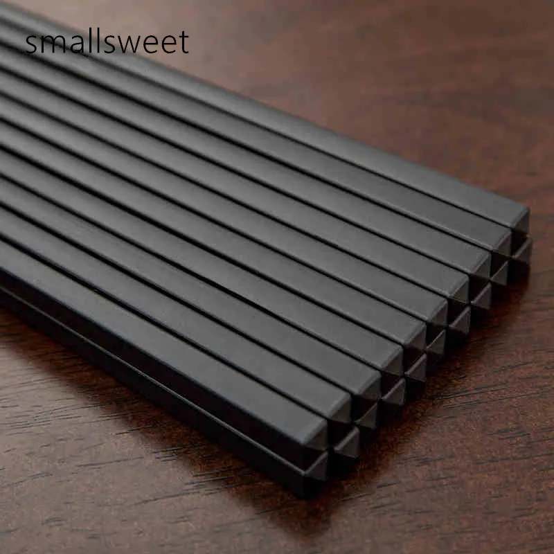 10 Pairs/set Black chopsticks porcelain chopsticks pattern black chopsticks kitchen utensil dinnerware household 27cm chopsticks
10 Pairs/set Black chopsticks porcelain chopsticks pattern black chopsticks kitchen utensil dinnerware household 27cm chopsticks