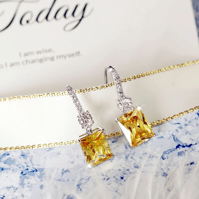 Fashion Elegant Sparkling Classic oblong Lemon yellow Stone Cubic zirconia Drop Earrings Women Jewelry White Gold Color Female
Fashion Elegant Sparkling Classic oblong Lemon yellow Stone Cubic zirconia Drop Earrings Women Jewelry White Gold Color Female