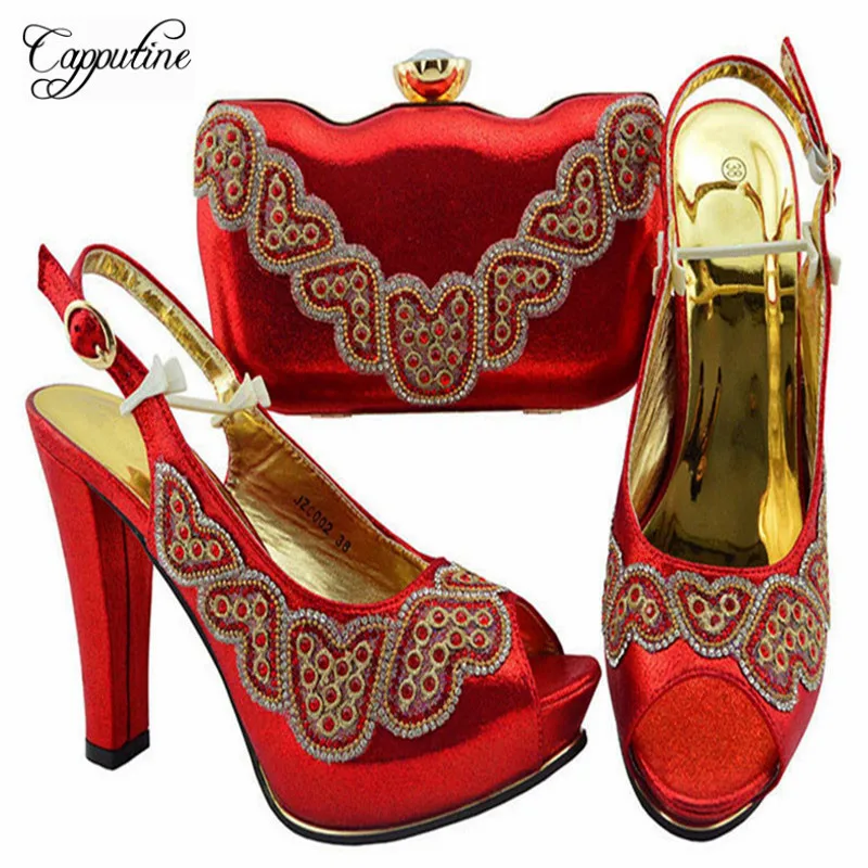 Capputine/комплект из туфель и сумочки красного цвета со стразами в нигерийском стиле; Вечерний комплект из туфель на высоком каблуке 11,5 см и сум...
Capputine/комплект из туфель и сумочки красного цвета со стразами в нигерийском стиле; Вечерний комплект из туфель на высоком каблуке 11,5 см и сум...