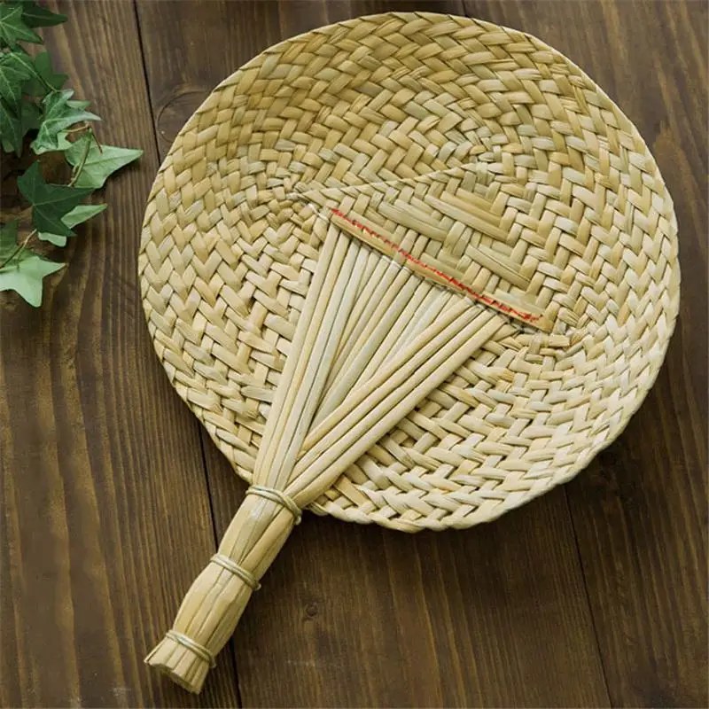 Vintage Hand-Woven Fan Innovative Handmade Cattail Leaf Braided Round Hand Held Wind Fans
Vintage Hand-Woven Fan Innovative Handmade Cattail Leaf Braided Round Hand Held Wind Fans