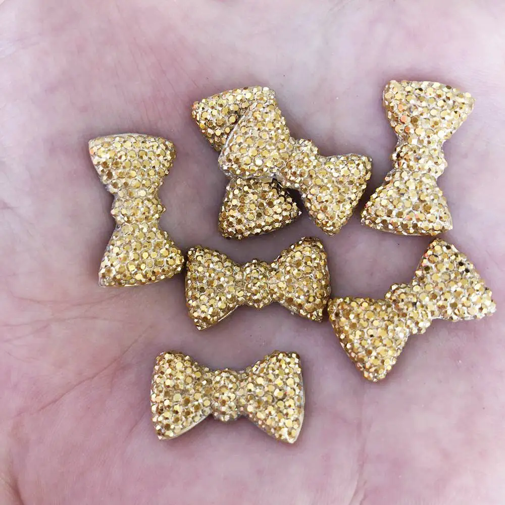 DIY 20pcs 12mm*20mm AB Resin Gold Bow Flatback Rhinestone Wedding Buttons Craft DIY Resin Ornaments F277
DIY 20pcs 12mm*20mm AB Resin Gold Bow Flatback Rhinestone Wedding Buttons Craft DIY Resin Ornaments F277