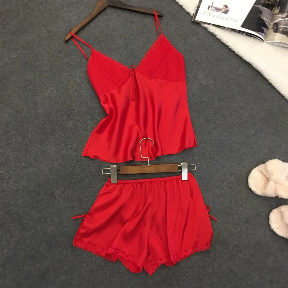 Summer style pajamas sets Women Female Sleep set Women's Deep V-neck Sexy Spaghetti Strap Shorts Sleepwear silk homewear
Summer style pajamas sets Women Female Sleep set Women's Deep V-neck Sexy Spaghetti Strap Shorts Sleepwear silk homewear
