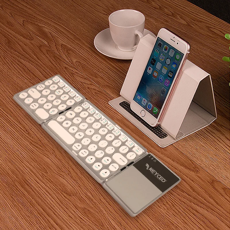 Portable Folding bluetooth Wireless Keyboard B033 Rechargeable Foldable Touchpad Keypad for IOS/Android/Windows ipad Tablet
Portable Folding bluetooth Wireless Keyboard B033 Rechargeable Foldable Touchpad Keypad for IOS/Android/Windows ipad Tablet