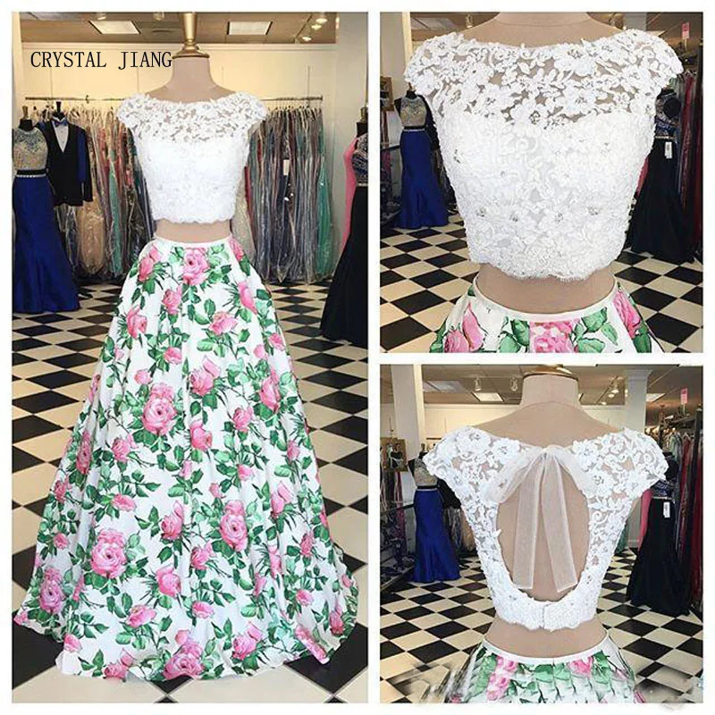 CRYSTAL JIANG Hot Sale White Lace applique Cap Sleeves Beaded Two Pieces Custom made floral printed Ball Gown Evening Dresses
CRYSTAL JIANG Hot Sale White Lace applique Cap Sleeves Beaded Two Pieces Custom made floral printed Ball Gown Evening Dresses