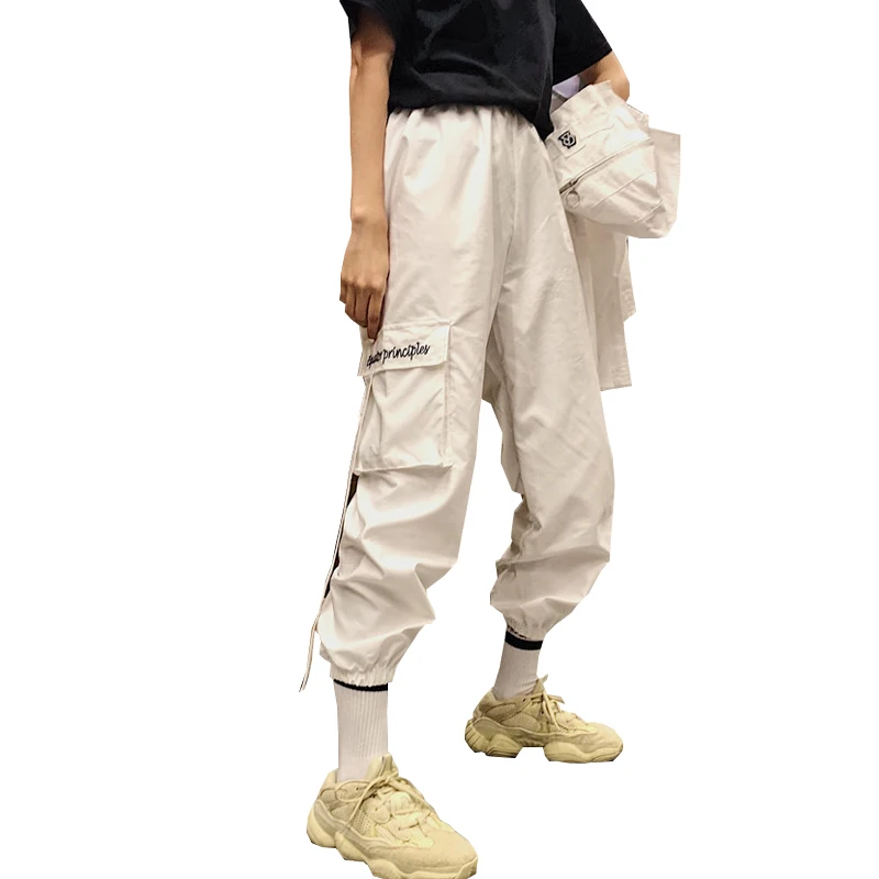 Брюки женские в стиле Харадзюку с вышивкой и лентами, длинные джоггеры с карманами и эластичным поясом, повседневные свободные спортивные штаны-Карго
Брюки женские в стиле Харадзюку с вышивкой и лентами, длинные джоггеры с карманами и эластичным поясом, повседневные свободные спортивные штаны-Карго