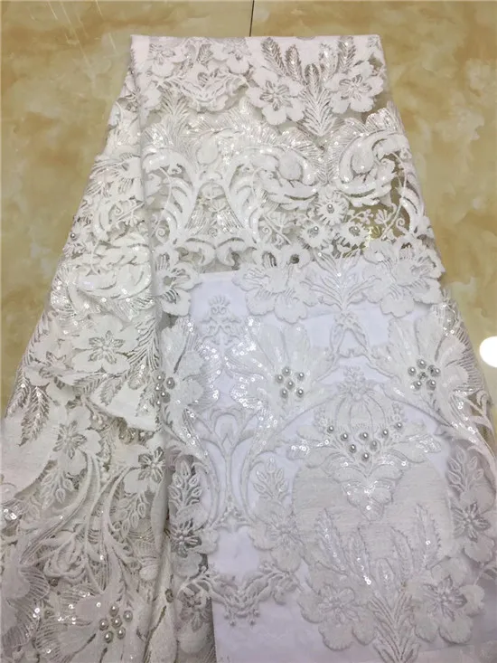 Latest white African Laces Fabrics Embroidered High Quality French Lace Fabric Cheap Nigerian Net tulle Lace Fabric
Latest white African Laces Fabrics Embroidered High Quality French Lace Fabric Cheap Nigerian Net tulle Lace Fabric