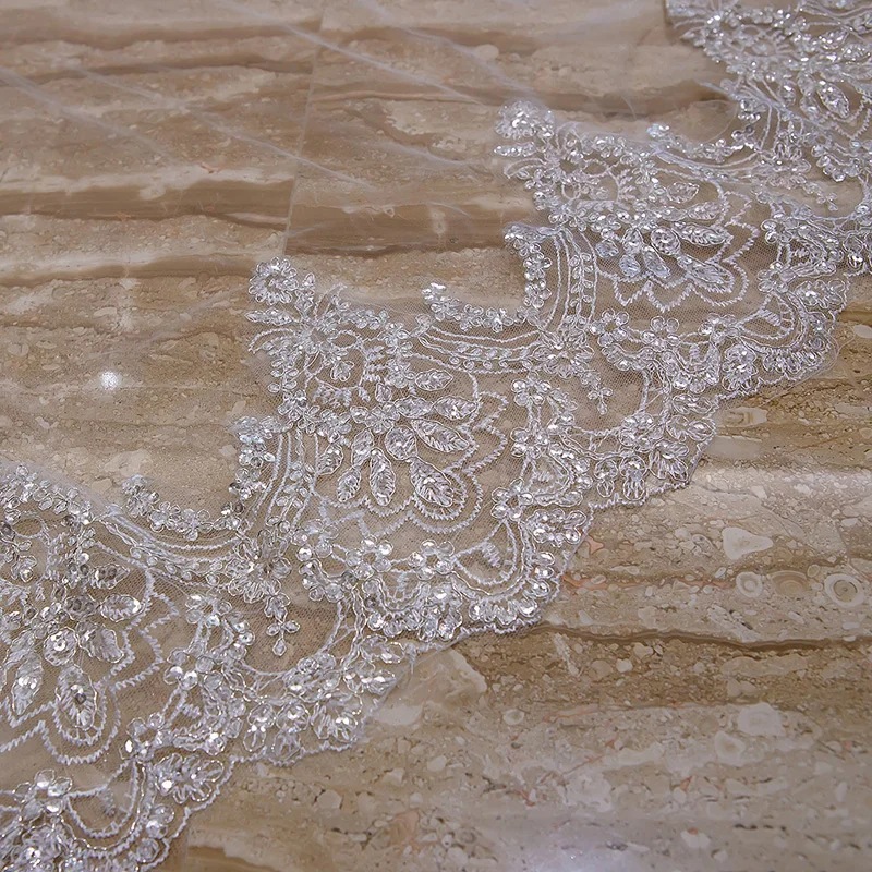 2018 Natural White 3M Wide 3.5M Long Cathedral Wedding Veil Sequins Lace Edge Three-layer Bridal Veils With Comb Voile Mariage
2018 Natural White 3M Wide 3.5M Long Cathedral Wedding Veil Sequins Lace Edge Three-layer Bridal Veils With Comb Voile Mariage