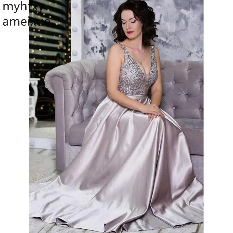 2021 Sexy White Plus Size Gow Evening Dresses V-neck Dress Floor Length Sleeveless Sequined Backless Custom Made Robe De Soiree
2021 Sexy White Plus Size Gow Evening Dresses V-neck Dress Floor Length Sleeveless Sequined Backless Custom Made Robe De Soiree