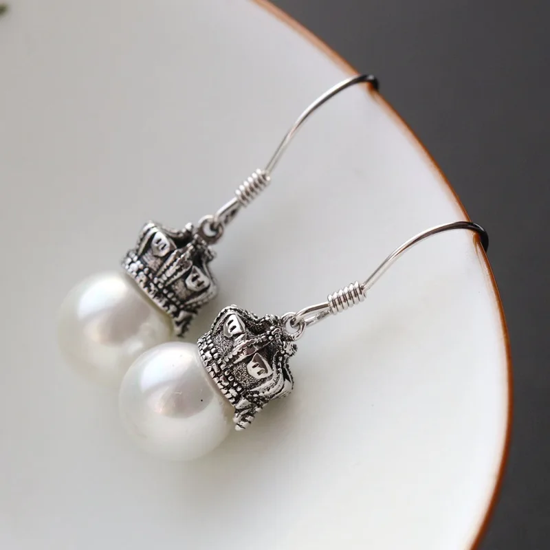 925 sterling silver earrings Ms fashion silver earrings Shell pearl has Thai crown silver earrings
925 sterling silver earrings Ms fashion silver earrings Shell pearl has Thai crown silver earrings