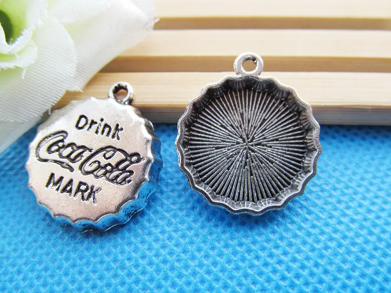 12pcs Antique Silver tone/ bronze Bottle Cap Round Base/Bezel Setting Tray Pendant Charm/Finding,fit 18mm Cabochon/Cameo,DIY A
12pcs Antique Silver tone/ bronze Bottle Cap Round Base/Bezel Setting Tray Pendant Charm/Finding,fit 18mm Cabochon/Cameo,DIY A
