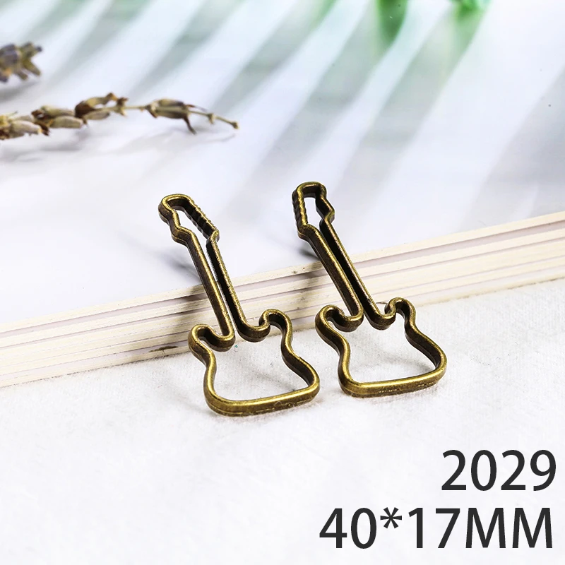 40*17mm 6pcs Guitar Alloy Pendant For Diy Jewelry Making 2 Colors Antique Silver Antique Bronze No.2029
40*17mm 6pcs Guitar Alloy Pendant For Diy Jewelry Making 2 Colors Antique Silver Antique Bronze No.2029