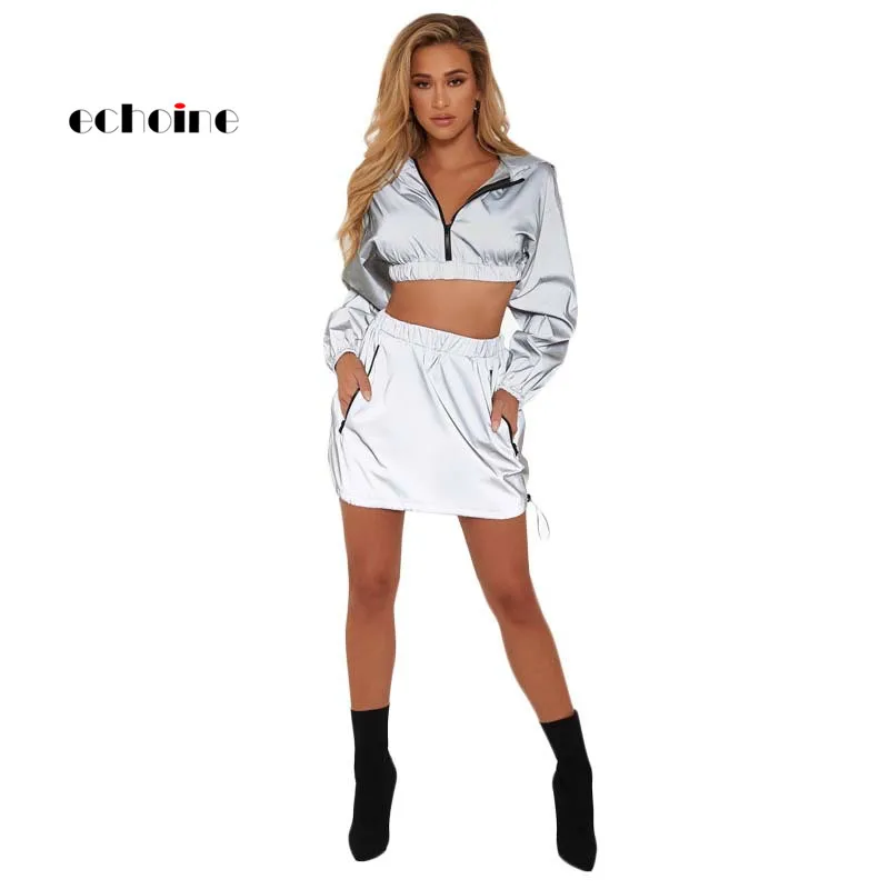 Echoine Women 2 Piece Set Sexy Reflective Light Crop Tops Hooded Long Sleeved Gray Mini Skirts Sports Suits Pullover Windbreaker
Echoine Women 2 Piece Set Sexy Reflective Light Crop Tops Hooded Long Sleeved Gray Mini Skirts Sports Suits Pullover Windbreaker