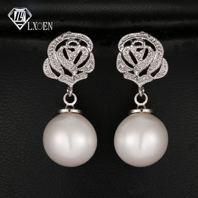 LXOEN Elegant Round Simulated Pearl Earrings With Flower Shape Silver Color Crystal Earrings Jewelry Gift Pendientes
LXOEN Elegant Round Simulated Pearl Earrings With Flower Shape Silver Color Crystal Earrings Jewelry Gift Pendientes