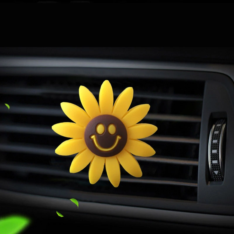 Sunflower smiling face car Air conditioning outlet perfume car perfume car interior accessories car fragrance
Sunflower smiling face car Air conditioning outlet perfume car perfume car interior accessories car fragrance