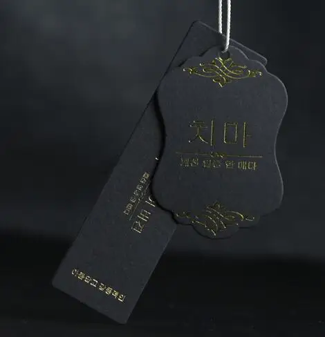 Custom black paper gold silver foil uv spot clothing Hang Tags/cloth tags garment labels,bags labels and tags hanging tags
Custom black paper gold silver foil uv spot clothing Hang Tags/cloth tags garment labels,bags labels and tags hanging tags