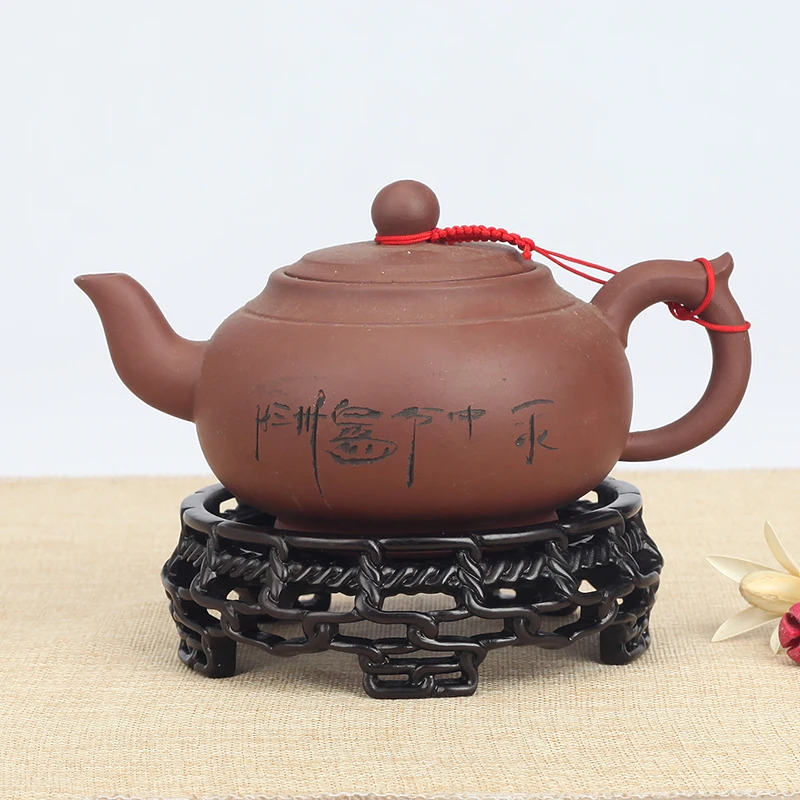 Wood Hollow out whole material teapot base solid wood round vase porcelain ceramic fish tank vase bonsai ornaments base
Wood Hollow out whole material teapot base solid wood round vase porcelain ceramic fish tank vase bonsai ornaments base