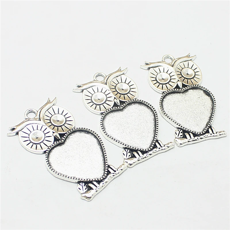 Sweet Bell 15 pcs Antique silver Metal Alloy owl 24*41mm (Fit 20mm dia) heart Cabochon Pendant Settings 8D1392
Sweet Bell 15 pcs Antique silver Metal Alloy owl 24*41mm (Fit 20mm dia) heart Cabochon Pendant Settings 8D1392