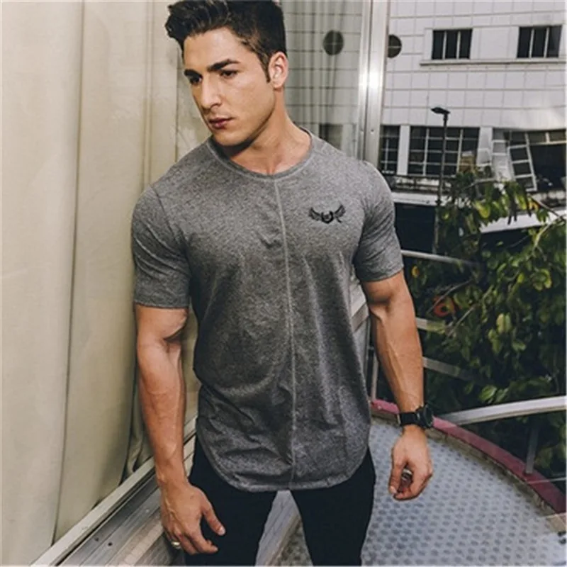 Summer Quick Dry Mens Gym Fitness T-shirt Sport Shirt Men Workout Clothing Bodybuilding Running t shirt Male Jogging Tee Tops
Summer Quick Dry Mens Gym Fitness T-shirt Sport Shirt Men Workout Clothing Bodybuilding Running t shirt Male Jogging Tee Tops