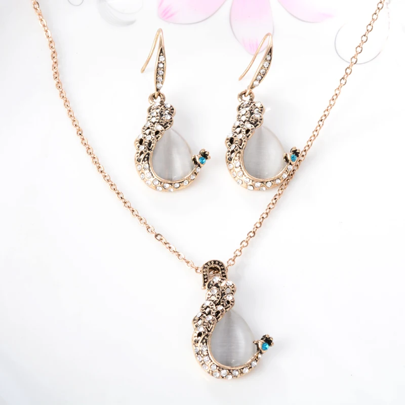 Women Jewelry Gold-Color Austria Crystal Shiny Rhinestone Opal Peacock Pendant Necklace/Earrings Wedding Jewelry Sets
Women Jewelry Gold-Color Austria Crystal Shiny Rhinestone Opal Peacock Pendant Necklace/Earrings Wedding Jewelry Sets