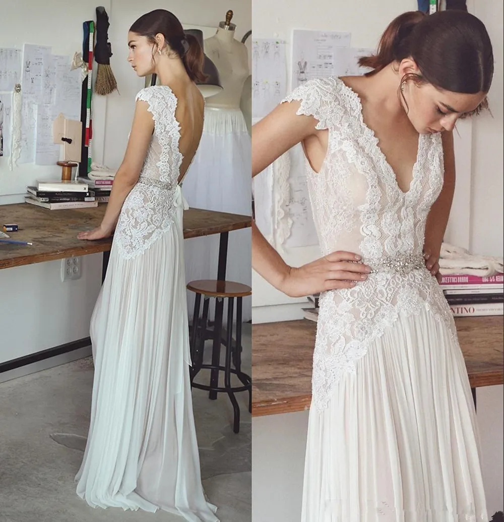 Vintage Boho Wedding Dresses 2020 Bohemian Bridal Gowns Cap Sleeves V Neck Pleated Skirt A-Line vestido de novia robe de mariee
Vintage Boho Wedding Dresses 2020 Bohemian Bridal Gowns Cap Sleeves V Neck Pleated Skirt A-Line vestido de novia robe de mariee