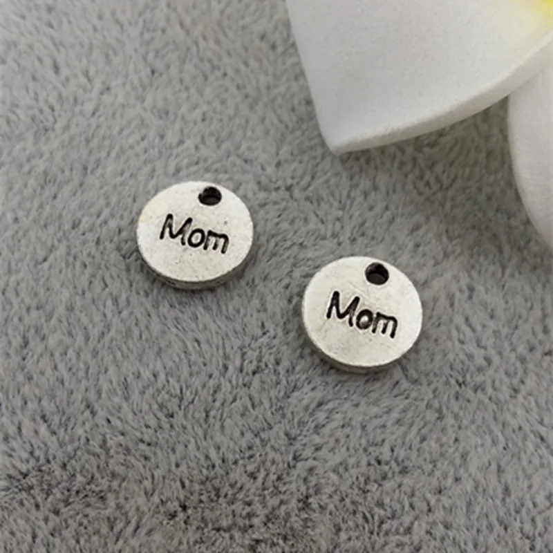 20pcs size 10mm Vintage Ancient Silver color Zinc Alloy Round Tag letter Mom Charms For Jewelry Pendant with hole Making
20pcs size 10mm Vintage Ancient Silver color Zinc Alloy Round Tag letter Mom Charms For Jewelry Pendant with hole Making