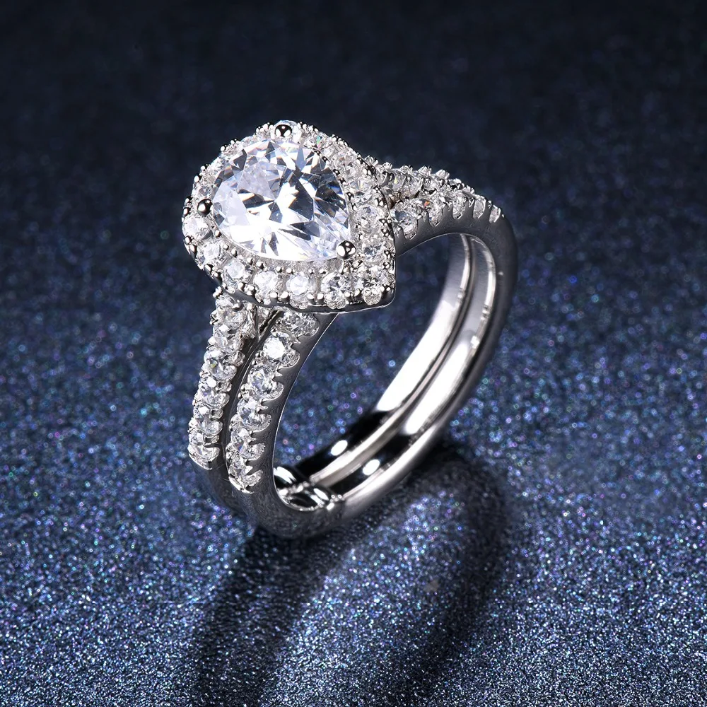 Classic 1.5 carats Pear Diamond CZ Halo Wedding Ring Sets 2-in-1 Solid 925 Sterling Silver Engagement Ring For Women Bridal
Classic 1.5 carats Pear Diamond CZ Halo Wedding Ring Sets 2-in-1 Solid 925 Sterling Silver Engagement Ring For Women Bridal