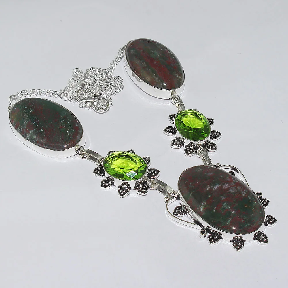 

Серебристое ожерелье из камня и периточек, покрытое медью, 48,7 см, N1236