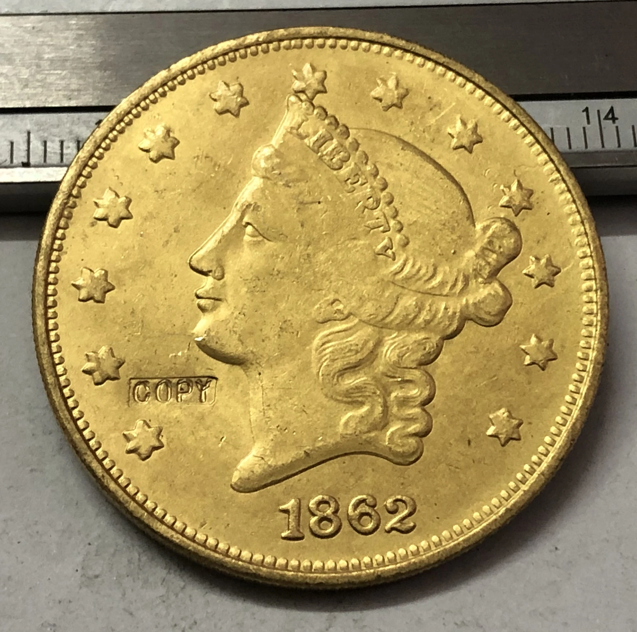 1862 P.O.S United States LIBERTY HEAD (NO MOTTO ON REVERSE) $20 Gold Plated Copy Coin
1862 P.O.S United States LIBERTY HEAD (NO MOTTO ON REVERSE) $20 Gold Plated Copy Coin
