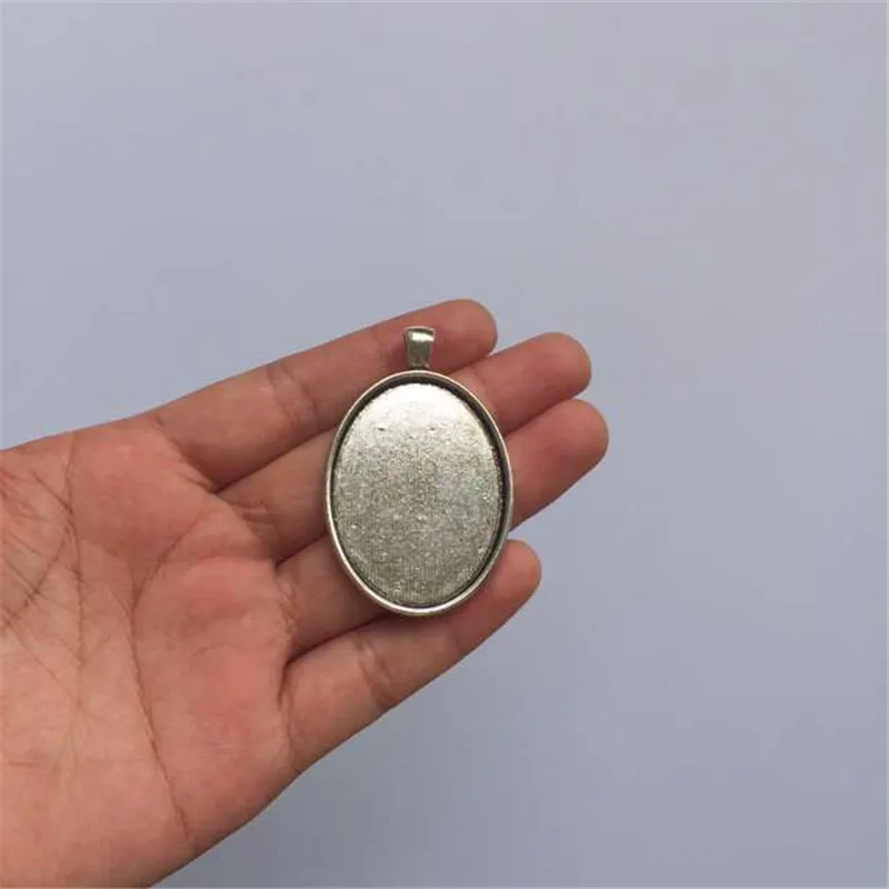 Bronze Silver Cameo Cabochon Oval Base Setting Pendants Fits 40*30mm Base Glass Cabochons Jewelry Findings 10PCS T015
Bronze Silver Cameo Cabochon Oval Base Setting Pendants Fits 40*30mm Base Glass Cabochons Jewelry Findings 10PCS T015