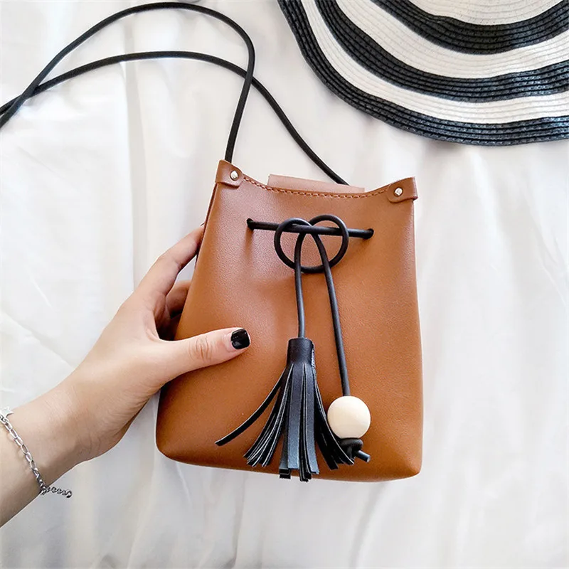 New wild small bag mini mobile phone bag female casual Messenger bag tassel simple wild retro tassel tide bag NB068
New wild small bag mini mobile phone bag female casual Messenger bag tassel simple wild retro tassel tide bag NB068