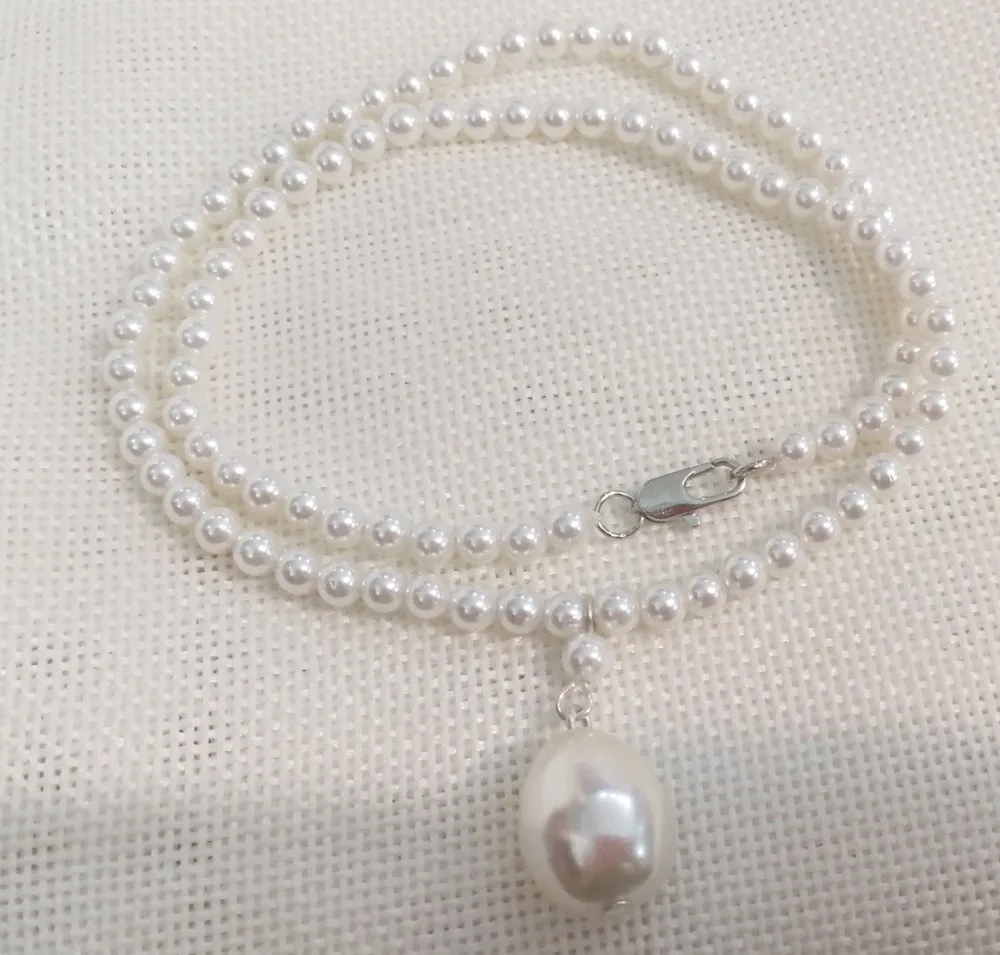 Women Jewelry necklace 4mm white round bead 14mm pendant natural south sea shell pearl handmade necklace
Women Jewelry necklace 4mm white round bead 14mm pendant natural south sea shell pearl handmade necklace