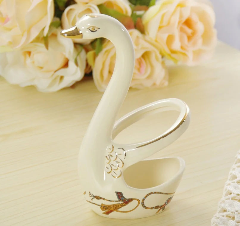 Ceramic Swan Figurine Fruit and Cake Fork Organizer Rack Decorative Porcelain Dinnerware Utility Craft Gift Ornament Accessories
Ceramic Swan Figurine Fruit and Cake Fork Organizer Rack Decorative Porcelain Dinnerware Utility Craft Gift Ornament Accessories